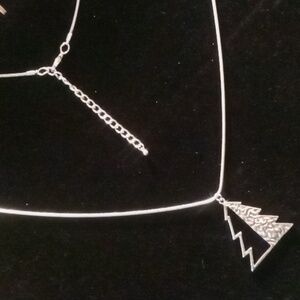 Holliday Lane Christmas tree snake chain necklace. 32 inches long